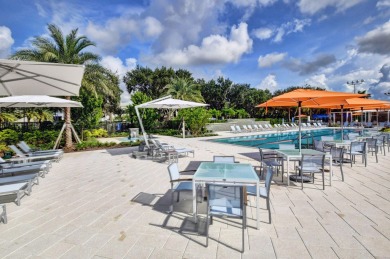 Enjoy the Florida lifestyle in this gorgeous 3rd-floor condo in on Boca Grove Golf and Tennis in Florida - for sale on GolfHomes.com, golf home, golf lot