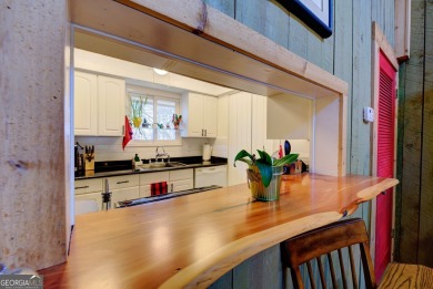 This charming and spacious 1900 square foot condo, situated just on Kingwood Golf Club and Resort in Georgia - for sale on GolfHomes.com, golf home, golf lot
