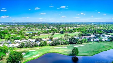 Welcome to 2632 SW Greenwich, a stunning lakefront property in on Monarch Country Club in Florida - for sale on GolfHomes.com, golf home, golf lot