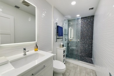 Discover this exquisite two bedroom, two bathroom upgraded & on Boca Grove Golf and Tennis in Florida - for sale on GolfHomes.com, golf home, golf lot