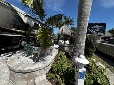 Welcome to this enchanted water and golf front tiki lot! Over on Nicholas Golf Club in Florida - for sale on GolfHomes.com, golf home, golf lot