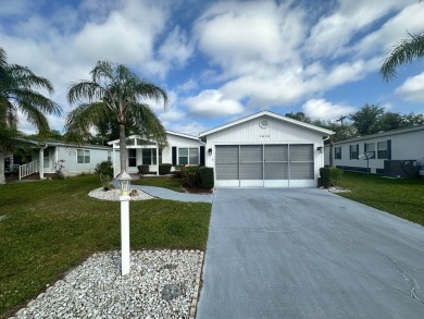 Lot Rent $1037.00  This well cared for 2 bedrooms, 2 bathrooms on Del Tura Golf and Country Club in Florida - for sale on GolfHomes.com, golf home, golf lot