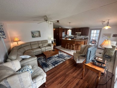 Lot Rent $1037.00  This well cared for 2 bedrooms, 2 bathrooms on Del Tura Golf and Country Club in Florida - for sale on GolfHomes.com, golf home, golf lot