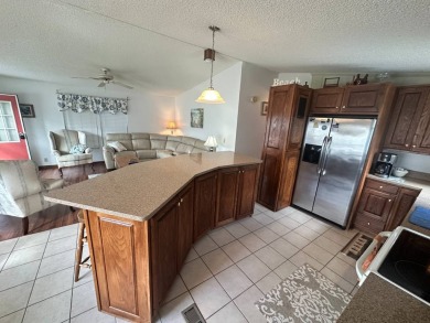 Lot Rent $1037.00  This well cared for 2 bedrooms, 2 bathrooms on Del Tura Golf and Country Club in Florida - for sale on GolfHomes.com, golf home, golf lot
