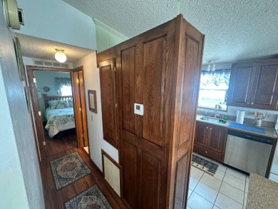 Lot Rent $1037.00  This well cared for 2 bedrooms, 2 bathrooms on Del Tura Golf and Country Club in Florida - for sale on GolfHomes.com, golf home, golf lot