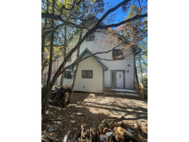 Timber framed, tri-level home with partially finished basement on The Lodge Golf Course in New Mexico - for sale on GolfHomes.com, golf home, golf lot