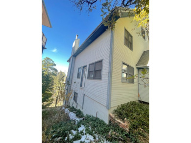 Timber framed, tri-level home with partially finished basement on The Lodge Golf Course in New Mexico - for sale on GolfHomes.com, golf home, golf lot