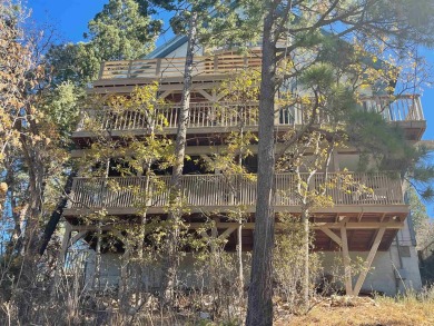 Timber framed, tri-level home with partially finished basement on The Lodge Golf Course in New Mexico - for sale on GolfHomes.com, golf home, golf lot