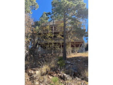 Timber framed, tri-level home with partially finished basement on The Lodge Golf Course in New Mexico - for sale on GolfHomes.com, golf home, golf lot