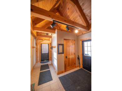 This spectacular Post & Beam home is located just off the 13th on Mount Snow Golf Club in Vermont - for sale on GolfHomes.com, golf home, golf lot