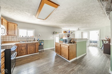 MOTIVATED SELLERS! Step inside this charming 3-bedroom, 2-bath on Meadowbrook Golf Course in Indiana - for sale on GolfHomes.com, golf home, golf lot