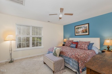 Modern style, unbeatable location, and low-maintenance on Hedingham Golf and Athletic Club in North Carolina - for sale on GolfHomes.com, golf home, golf lot