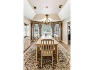 You are going to love this all brick home situated on a large on Carolina Shores Golf Course in North Carolina - for sale on GolfHomes.com, golf home, golf lot