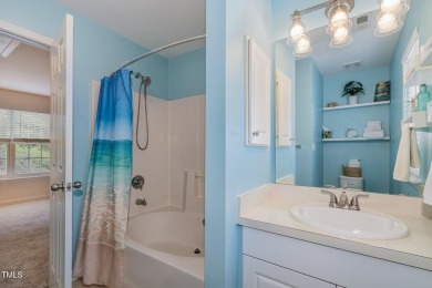 Modern style, unbeatable location, and low-maintenance on Hedingham Golf and Athletic Club in North Carolina - for sale on GolfHomes.com, golf home, golf lot