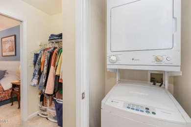 Modern style, unbeatable location, and low-maintenance on Hedingham Golf and Athletic Club in North Carolina - for sale on GolfHomes.com, golf home, golf lot