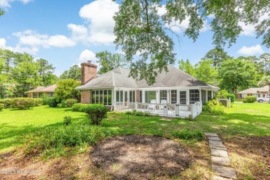 You are going to love this all brick home situated on a large on Carolina Shores Golf Course in North Carolina - for sale on GolfHomes.com, golf home, golf lot