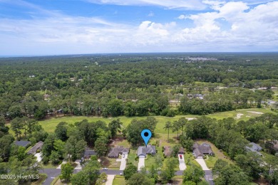 You are going to love this all brick home situated on a large on Carolina Shores Golf Course in North Carolina - for sale on GolfHomes.com, golf home, golf lot