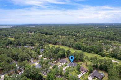 You are going to love this all brick home situated on a large on Carolina Shores Golf Course in North Carolina - for sale on GolfHomes.com, golf home, golf lot