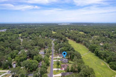 You are going to love this all brick home situated on a large on Carolina Shores Golf Course in North Carolina - for sale on GolfHomes.com, golf home, golf lot