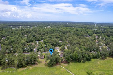 You are going to love this all brick home situated on a large on Carolina Shores Golf Course in North Carolina - for sale on GolfHomes.com, golf home, golf lot