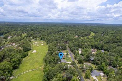 You are going to love this all brick home situated on a large on Carolina Shores Golf Course in North Carolina - for sale on GolfHomes.com, golf home, golf lot