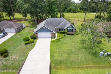 You are going to love this all brick home situated on a large on Carolina Shores Golf Course in North Carolina - for sale on GolfHomes.com, golf home, golf lot