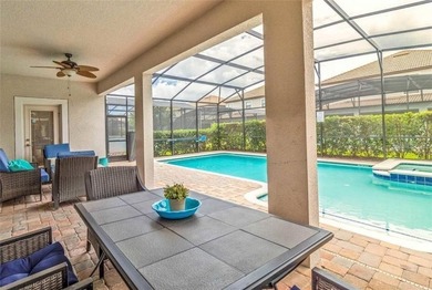 Beautifully maintained 6-bedroom, 6-bath home located in the on The Oasis Club at Champions Gate in Florida - for sale on GolfHomes.com, golf home, golf lot