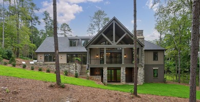 New Construction Masterpiece, nestled on Hole #1 of The Cove in on Reynolds Lake Oconee - The Oconee in Georgia - for sale on GolfHomes.com, golf home, golf lot