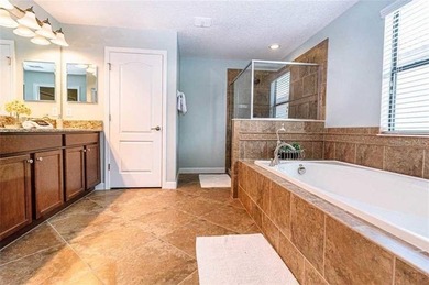 Beautifully maintained 6-bedroom, 6-bath home located in the on The Oasis Club at Champions Gate in Florida - for sale on GolfHomes.com, golf home, golf lot