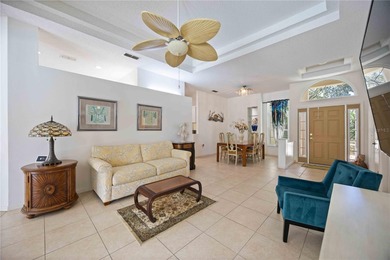 Step into this exceptional 4-bedroom, 2.5-bath pool home on The Venice Golf and Country Club in Florida - for sale on GolfHomes.com, golf home, golf lot