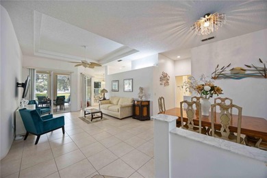 Step into this exceptional 4-bedroom, 2.5-bath pool home on The Venice Golf and Country Club in Florida - for sale on GolfHomes.com, golf home, golf lot