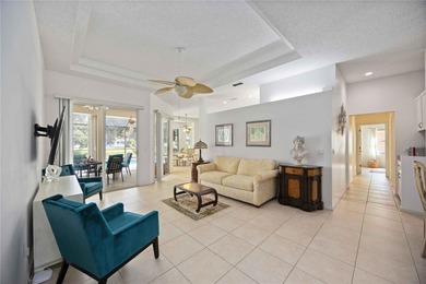 Step into this exceptional 4-bedroom, 2.5-bath pool home on The Venice Golf and Country Club in Florida - for sale on GolfHomes.com, golf home, golf lot
