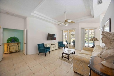 Step into this exceptional 4-bedroom, 2.5-bath pool home on The Venice Golf and Country Club in Florida - for sale on GolfHomes.com, golf home, golf lot