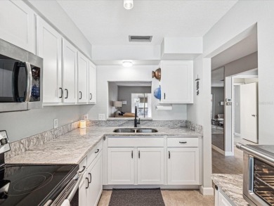 Welcome to this incredibly renovated condo in the Seven Springs on Seven Springs Golf and Country Club in Florida - for sale on GolfHomes.com, golf home, golf lot