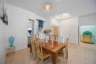 Step into this exceptional 4-bedroom, 2.5-bath pool home on The Venice Golf and Country Club in Florida - for sale on GolfHomes.com, golf home, golf lot