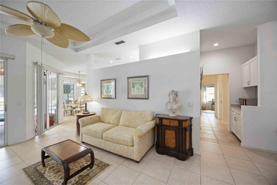 Step into this exceptional 4-bedroom, 2.5-bath pool home on The Venice Golf and Country Club in Florida - for sale on GolfHomes.com, golf home, golf lot