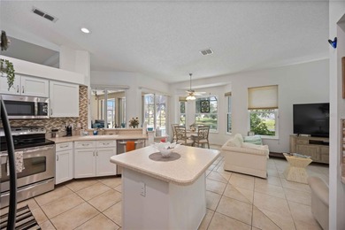 Step into this exceptional 4-bedroom, 2.5-bath pool home on The Venice Golf and Country Club in Florida - for sale on GolfHomes.com, golf home, golf lot