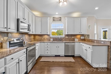 Set on the 16th hole of Lake Norman Golf Club, undergoing a full on Mallard Head Country Club in North Carolina - for sale on GolfHomes.com, golf home, golf lot