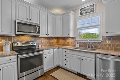 Set on the 16th hole of Lake Norman Golf Club, undergoing a full on Mallard Head Country Club in North Carolina - for sale on GolfHomes.com, golf home, golf lot