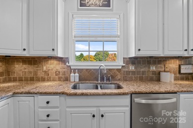 Set on the 16th hole of Lake Norman Golf Club, undergoing a full on Mallard Head Country Club in North Carolina - for sale on GolfHomes.com, golf home, golf lot