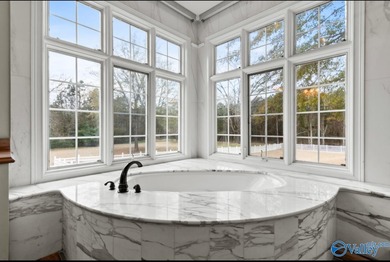 Beautiful custom-built home situated on 3.2 acres in the on Burningtree Country Club in Alabama - for sale on GolfHomes.com, golf home, golf lot