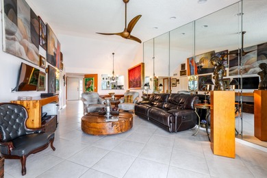 Wake up every day to shimmering waterfront and sweeping golf on Gleneagles Golf and Country Club in Florida - for sale on GolfHomes.com, golf home, golf lot