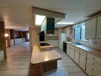 This lovely larger home has had a full roof replacement and All on Lakes at Leesburg Golf Course in Florida - for sale on GolfHomes.com, golf home, golf lot