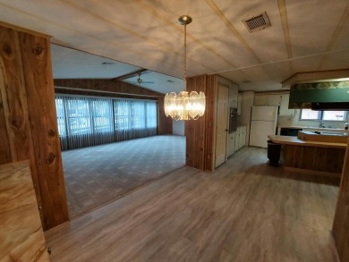 This lovely larger home has had a full roof replacement and All on Lakes at Leesburg Golf Course in Florida - for sale on GolfHomes.com, golf home, golf lot