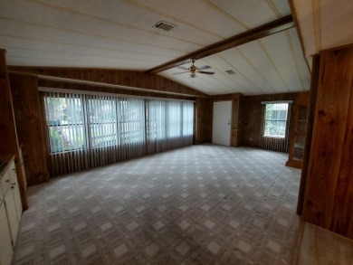 This lovely larger home has had a full roof replacement and All on Lakes at Leesburg Golf Course in Florida - for sale on GolfHomes.com, golf home, golf lot