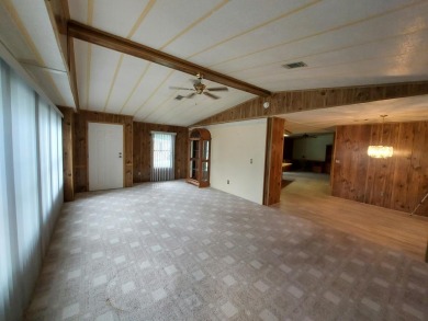 This lovely larger home has had a full roof replacement and All on Lakes at Leesburg Golf Course in Florida - for sale on GolfHomes.com, golf home, golf lot