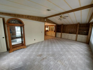 This lovely larger home has had a full roof replacement and All on Lakes at Leesburg Golf Course in Florida - for sale on GolfHomes.com, golf home, golf lot