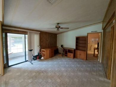 This lovely larger home has had a full roof replacement and All on Lakes at Leesburg Golf Course in Florida - for sale on GolfHomes.com, golf home, golf lot