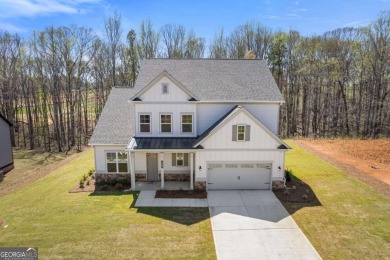 Welcome to your dream home at 3257 Traditions Way, a beautifully on Traditions of Braselton Golf Club in Georgia - for sale on GolfHomes.com, golf home, golf lot