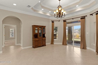 Step into refined coastal living in this beautifully maintained on Emerald Bay Golf Club in Florida - for sale on GolfHomes.com, golf home, golf lot